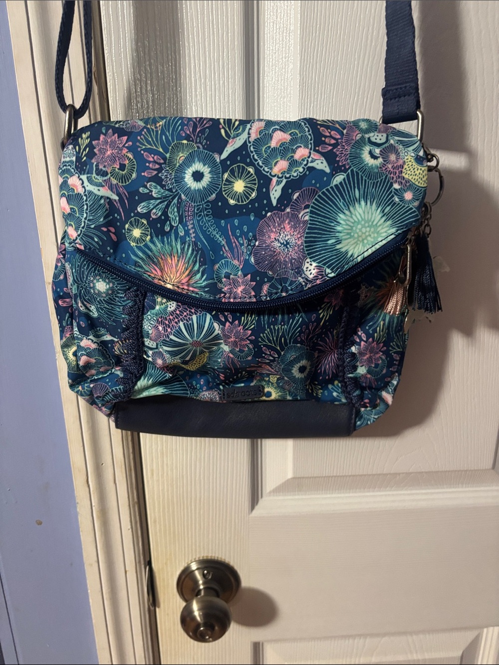 Sakroots Navy Floral Crossbody with Teal, Aqua, Pink and Yellow Accents